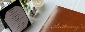 Anthony's Creative Italian Restaurant Social Media Case Study Image of table and menu