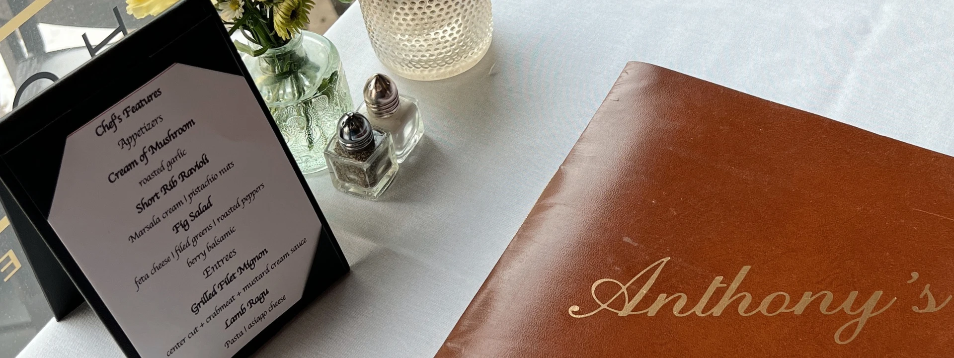 Anthony's Creative Italian Restaurant Social Media Case Study Image of table and menu